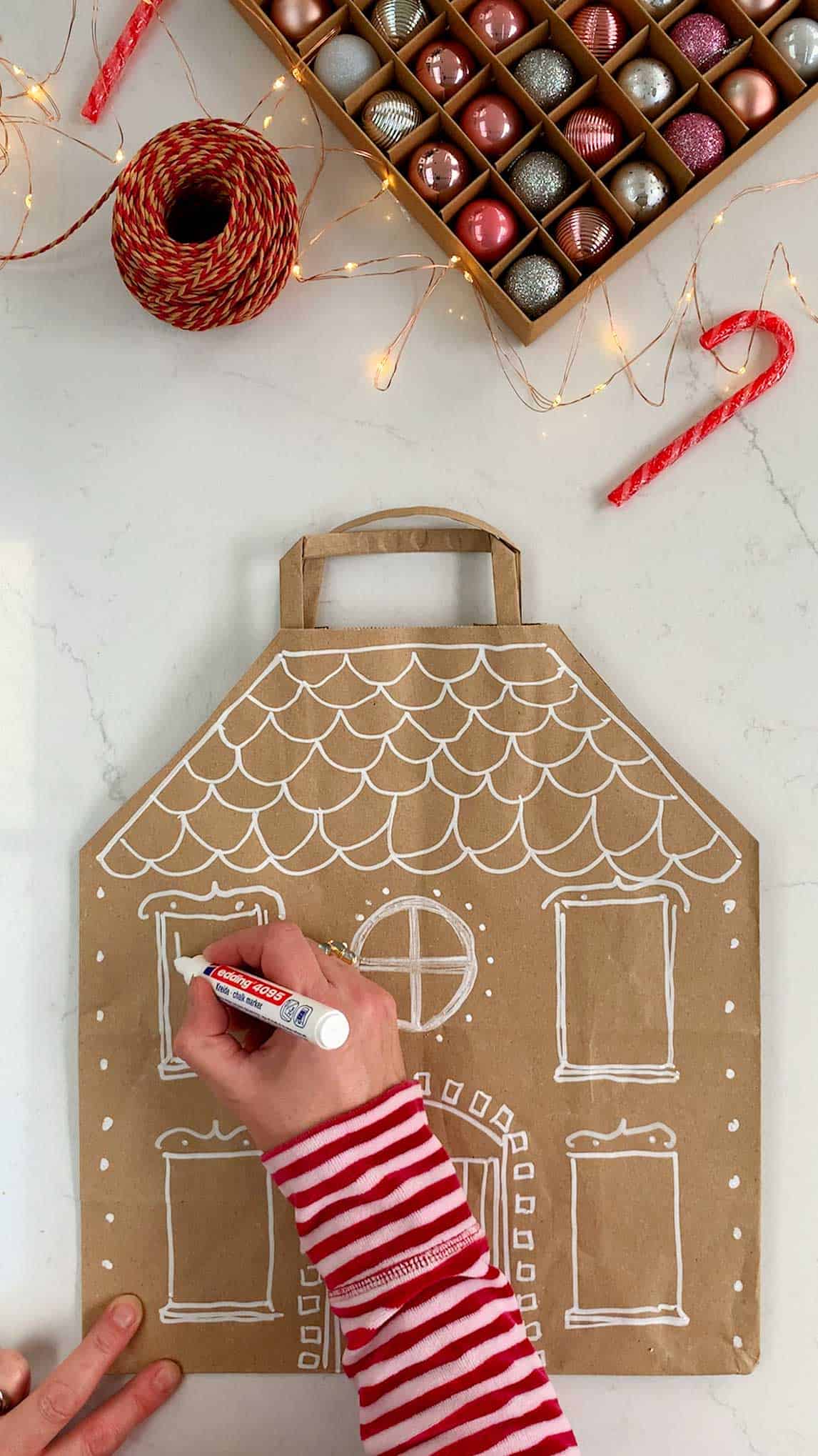 Make a DIY gingerbread house Christmas gift bag.