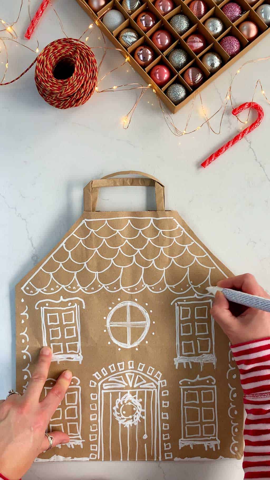 Make a DIY gingerbread house Christmas gift bag.