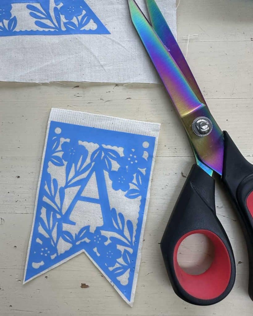 Easter banner pieces ready to sew onto the ribbon heading.