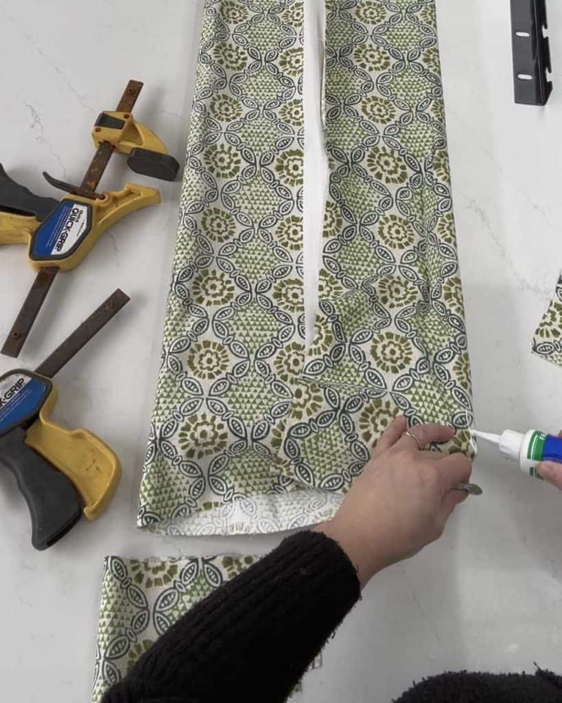 6. How to Upholster a Headboard: Put a little fabric glue on the edges of the fabric before you fold.