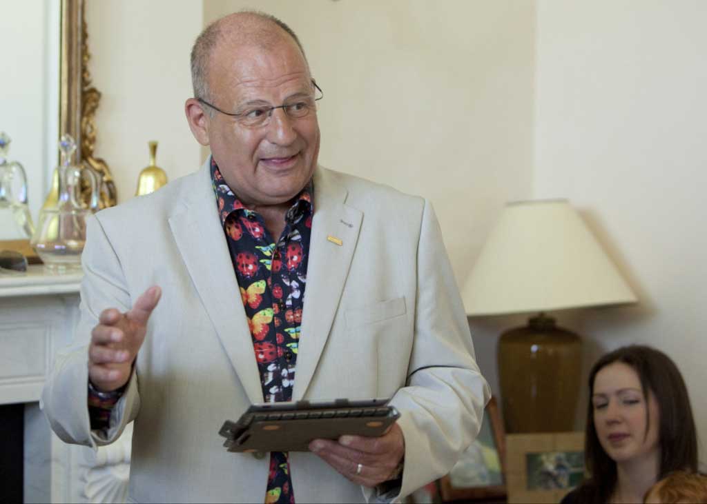 Celebrant, Peter Wylie, conducting the twins' naming ceremony.