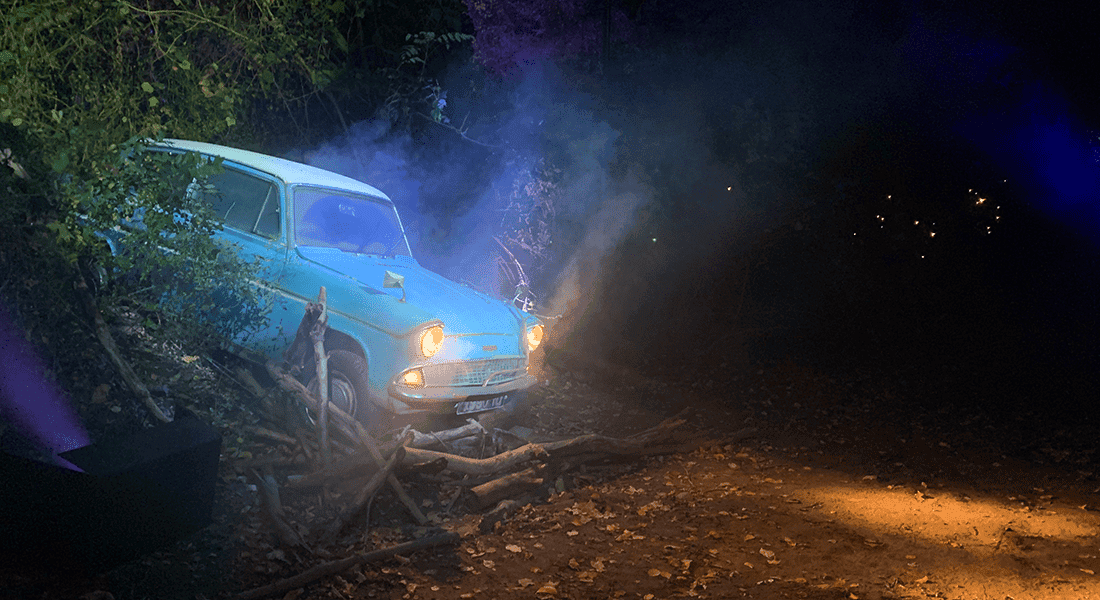 The Weasley's flying car from Harry Potter comes to rest on the forest ground after quite of an out-of-control adventure. (photo courtesy of Chris Armenia)