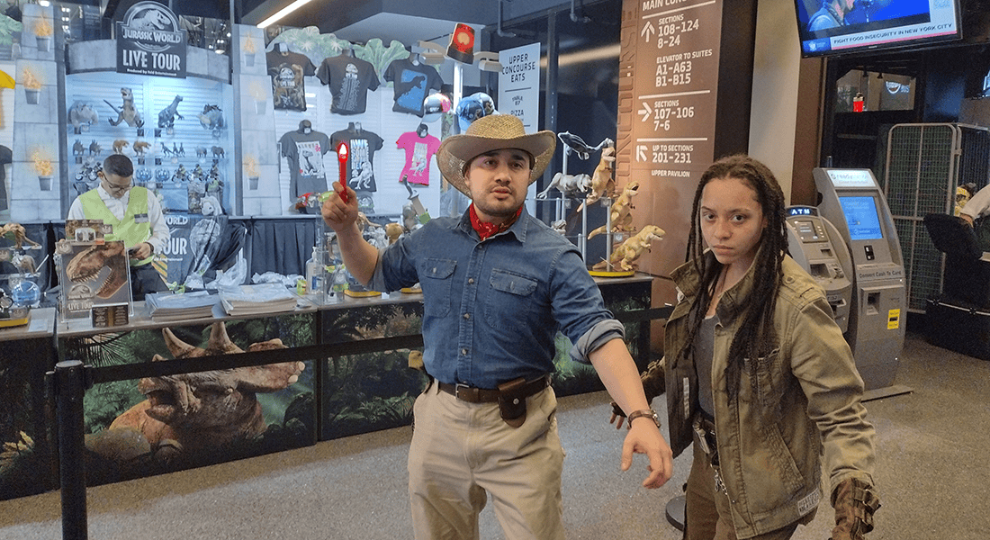 Cosplayers Asia-LittleWolf Neal and Irv Dante as Kayla Watts and Alan Grant take in a showing of Jurassic World Live