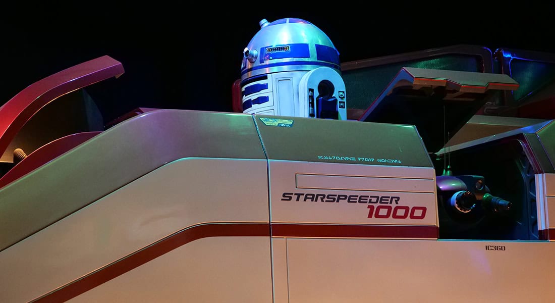 R2D2 aboard a Starspeeder 1000 in the queue for Star Tours (photo by Joe Tracy, © Theme Park Magazine).