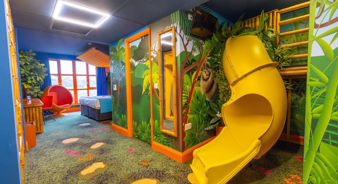 The Capri-Sun-themed room includes a slide!