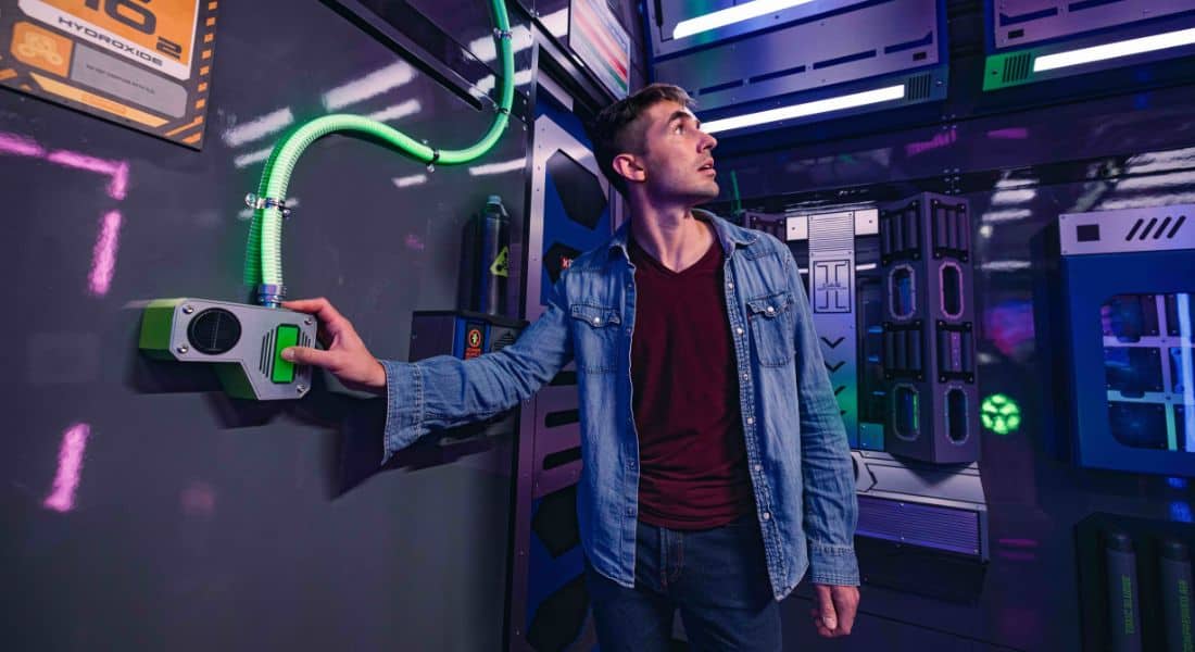 Teams race to save the galaxy in The Escape Game's Cosmic Crisis, a sci-fi escape room adventure in Brooklyn featuring AI guidance and interactive challenges...