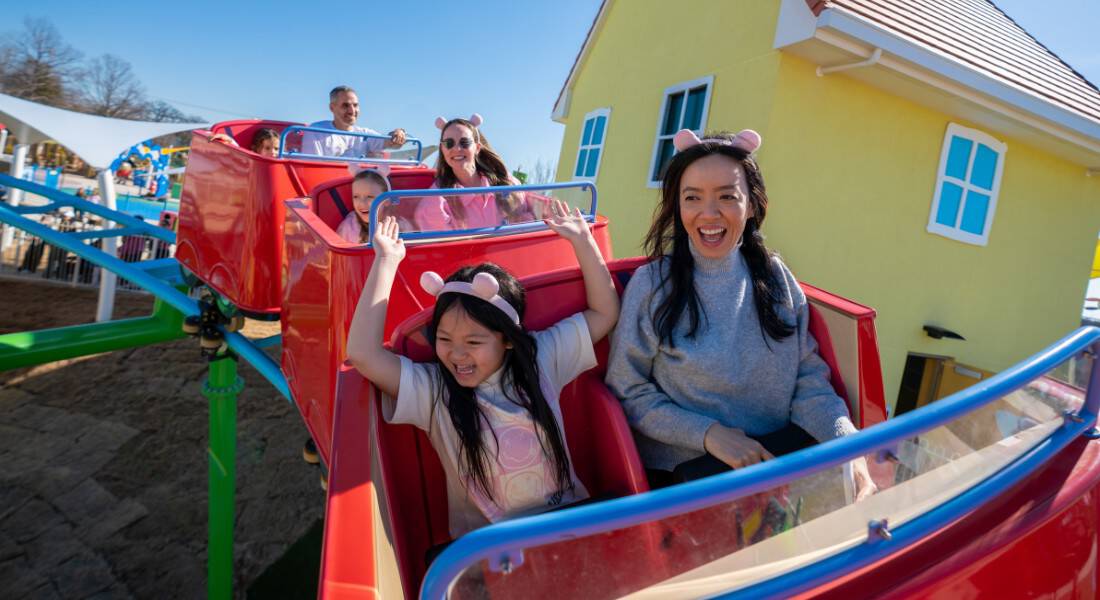 Daddy Pig Roller Coaster provides kids with a fun and non-scary introduction to roller coasters! (photo courtesy of ©Peppa Pig Theme Park)