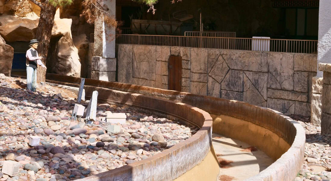 This is the deteriorating remains of the Adventure Canyon Log Flume. Here the log would round the corner and entered the casino. (photo by Joe Tracy for Theme Park Magazine)