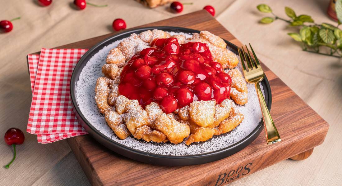 Cherry funnel cake during Cherry Jubilee (Photo by ©Gilroy Gardens Family Theme Park)