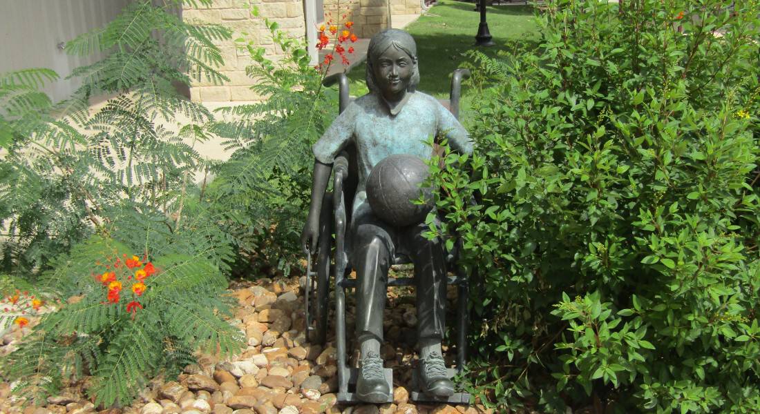 Sculptures throughout the park are testaments to the importance of accessibility and inclusivity. (photo by Stephanie Kaplan for Theme Park Magazine)