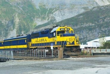 Train travelling through Alaska mountain range - Don?t Doubt Yourself?Spread Your Wings and Soar