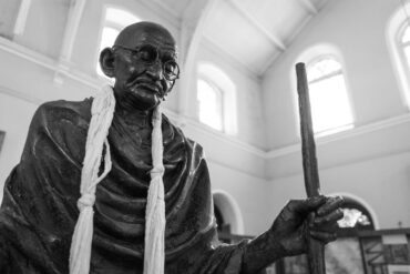 Statue of Mahatma Gandhi from Aga Khan palace in Pune, India - Gandhi?s Radical Insight: How It Can Help Us Today