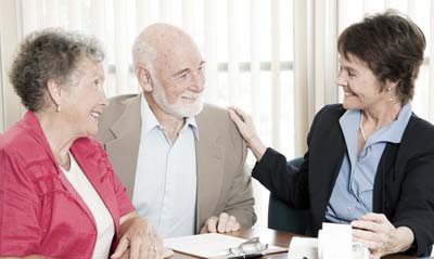 Insurance agent with old couple