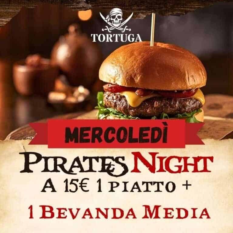 Delizioso burger gourmet con carne succulenta, formaggio fuso, insalata fresca e pomodoro, perfetto per una serata a Tortuga Bay RistoPub durante la programmazione invernale.