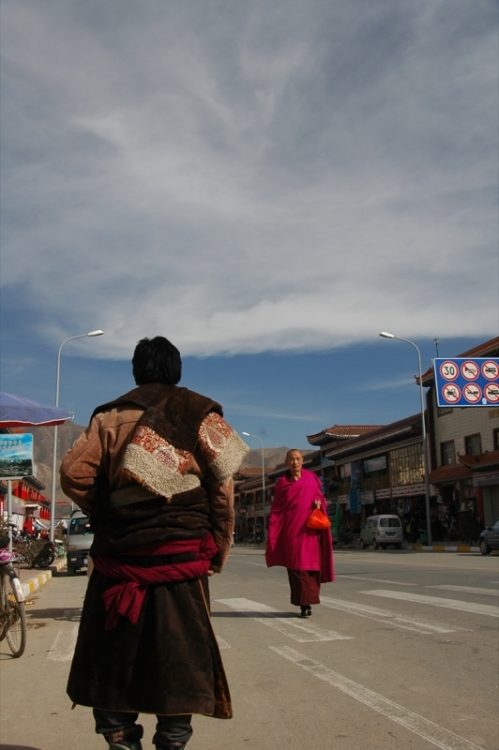Men Walking Down Street