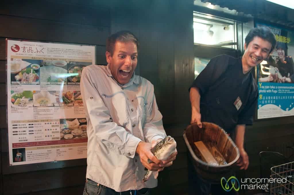 Dan holds the Fugu (blowfish) - Osaka, Japan