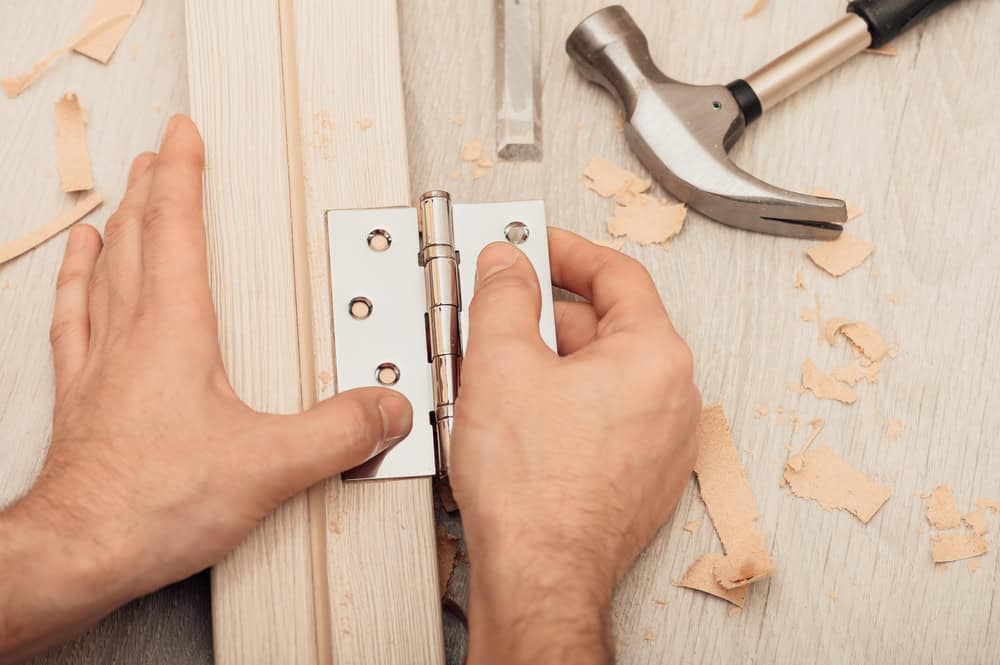 Installing,The,Door,Hinge,On,The,Door,Frame,Using,A