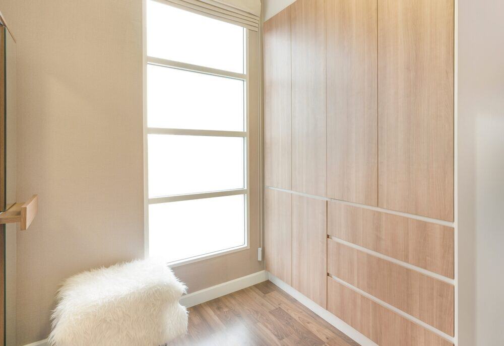 Dressing,Room,Corner,In,Bedroom,Has,A,Large,Window,Decorated