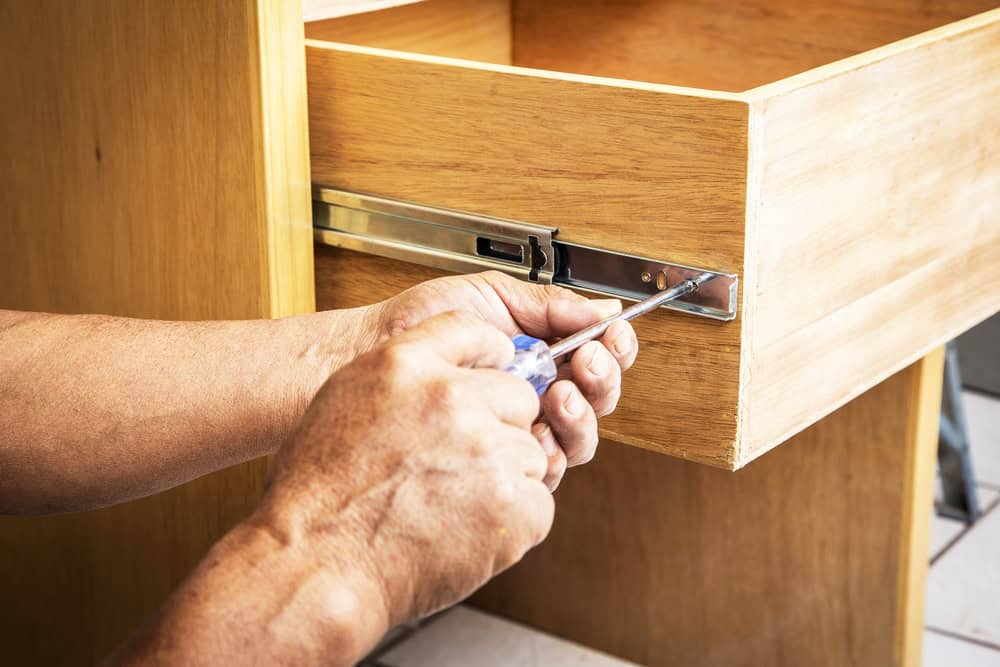 Worker,Of,The,Construction,Arming,A,Wood,Closet