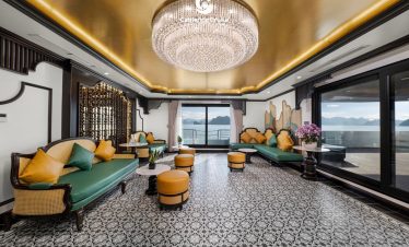 Elegant cruise lounge with scenic ocean view and luxurious decor at Viettrend Tour.