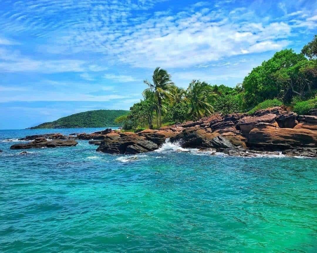 phu-quoc-rocky-coastline-pristine-beach-tropical-nature-viettrendtour