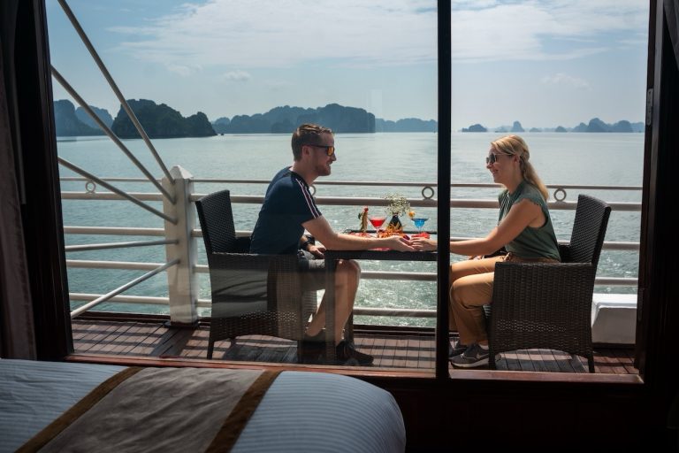 Clink glasses and watch the karsts drift by—slow travel tastes better together.
