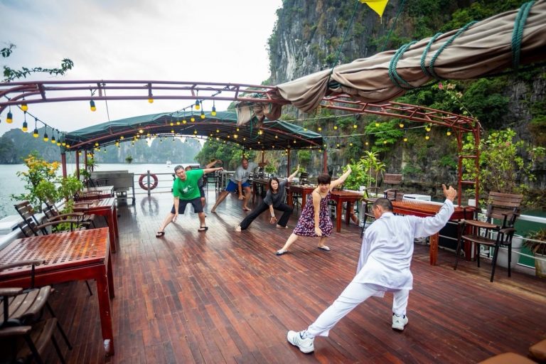 bai-tu-long-cruise-tai-chi-sundeck-limestone-cliffs-viettrendtour