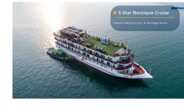 Luxury cruise ship in Halong Bay offering private tours and heritage shows.