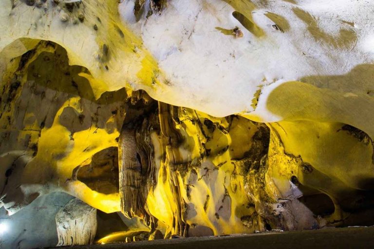 Step into vast honey-gold chambers in Trung Trang Cave, then sail calm Lan Ha Bay waters. Book with ViettrendTour via WhatsApp (+84) 898265688.