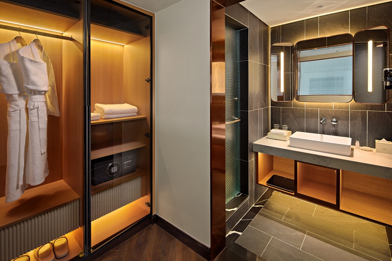 Luxury hotel closet and modern bathroom with stylish design, high-end amenities, perfect for travelers.