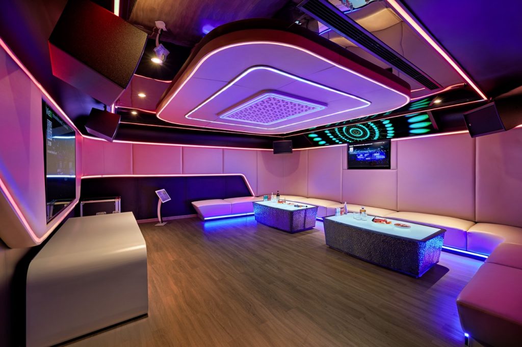 ViettrendTour luxury nightclub with vibrant LED lighting and modern interior design.