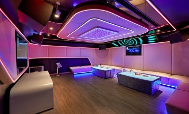 ViettrendTour luxury nightclub with vibrant LED lighting and modern interior design.