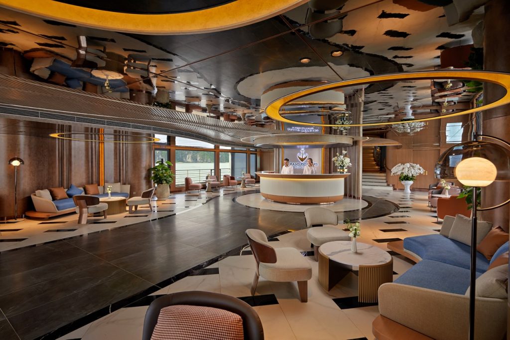 Modern luxury hotel lobby with stylish seating and elegant decor for upscale travel experience.