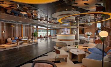 Modern luxury hotel lobby with stylish seating and elegant decor for upscale travel experience.