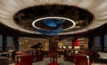 Elegant hotel lobby with modern circular chandelier and luxurious decor, perfect for upscale travel.