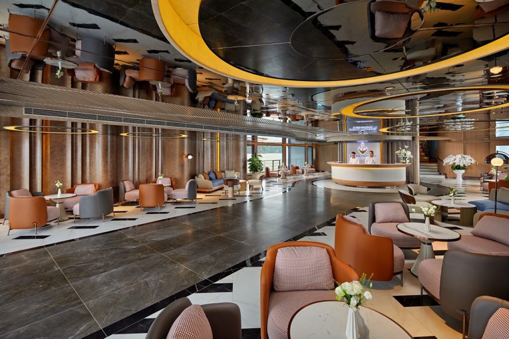 Elegant hotel lobby with stylish seating, modern decor, and a welcoming reception area.