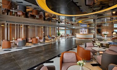 Elegant hotel lobby with stylish seating, modern decor, and a welcoming reception area.
