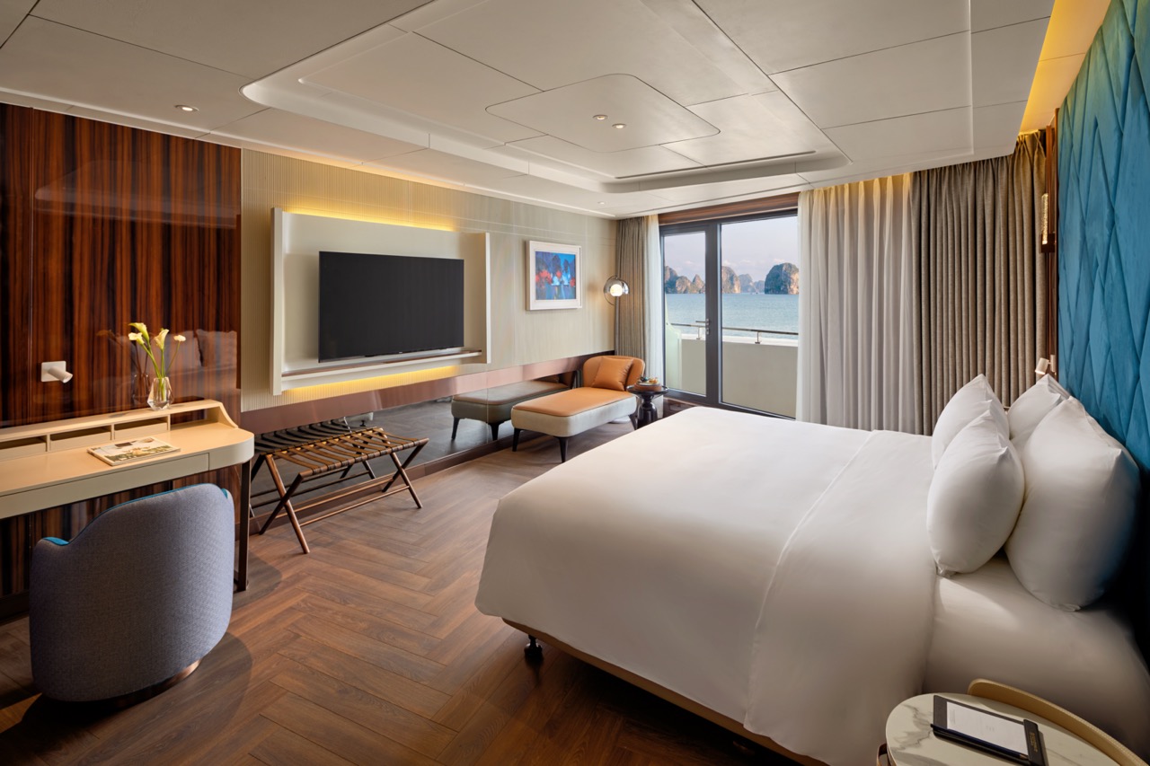 Luxurious hotel room with ocean view and modern decor, perfect for leisure travel.