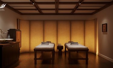 Relaxing massage therapy room with dual beds and warm ambient lighting for ultimate relaxation.