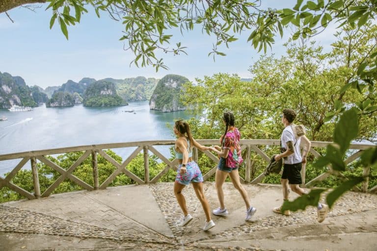 Hike to Titov’s lookout for a sweeping panorama of emerald waters and karst peaks—then unwind back on Ambassador Cruise. Book with ViettrendTour. WhatsApp (+84) 898265688.