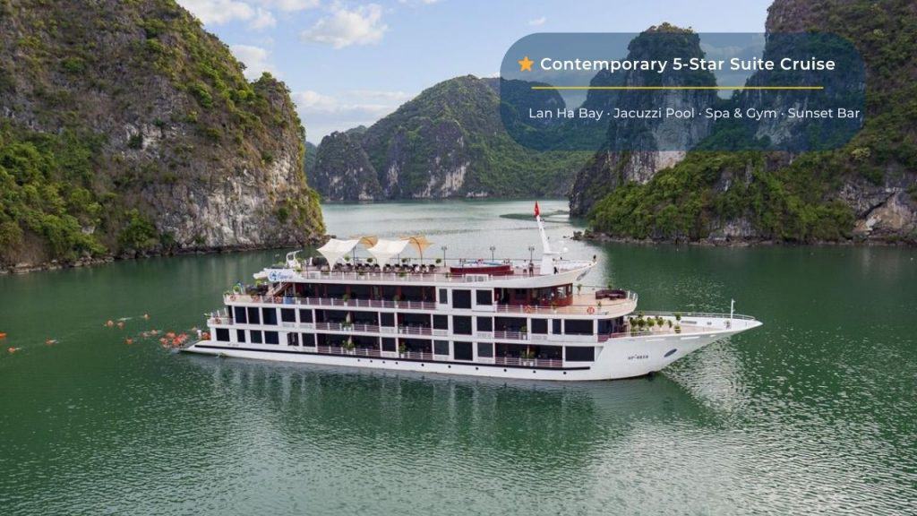 Luxury cruise ship on Lan Ha Bay with lush green limestone islands, perfect for Vietnam travel tours.
