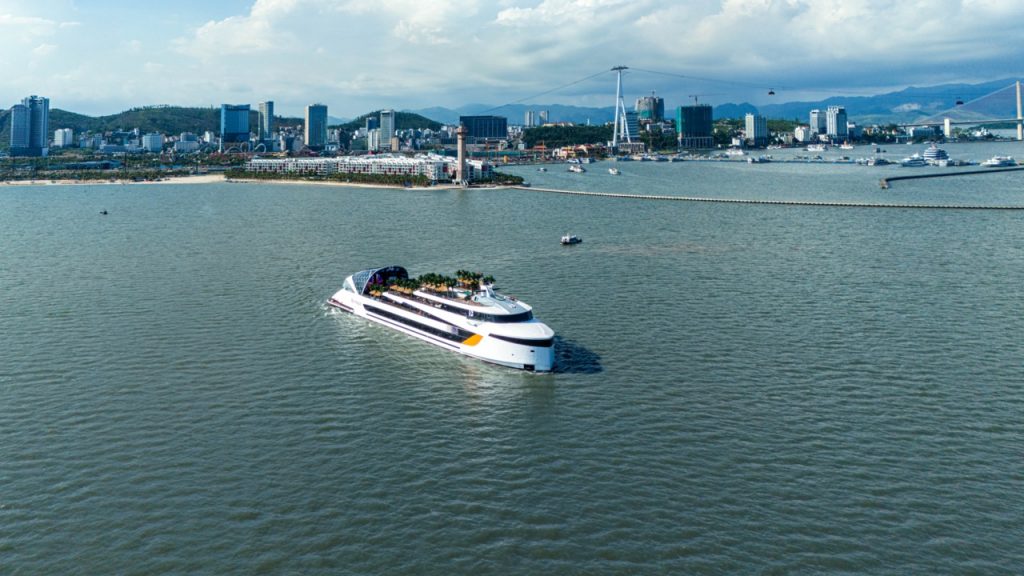 Luxury yacht cruising in the harbor of Ho Chi Minh City, Vietnam.