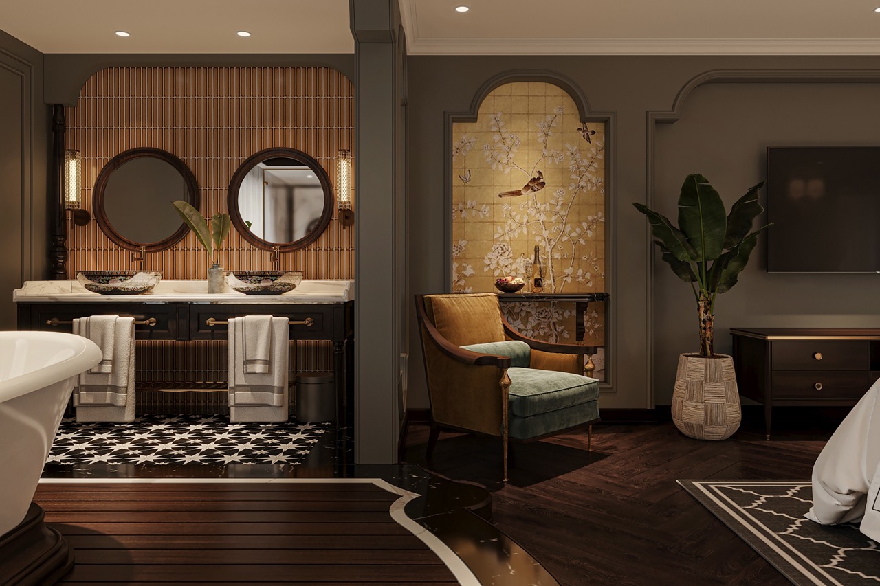 Elegant hotel suite with stylish decor, vintage armchair, and lush indoor plant, perfect for a luxury stay.