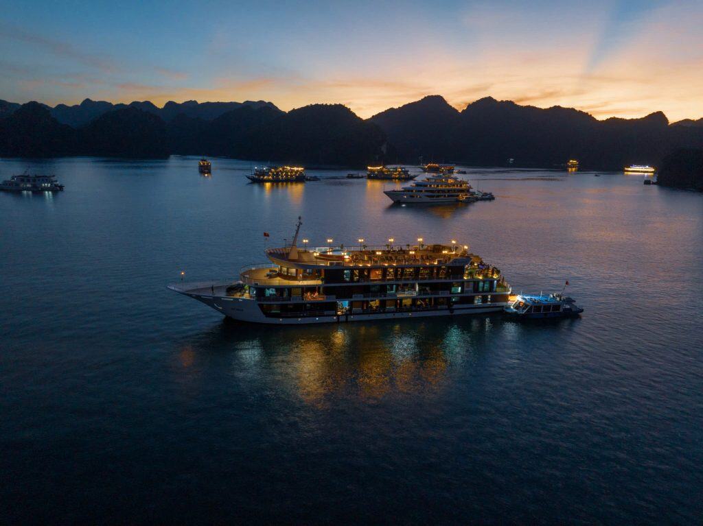 Luxurious cruise ships in Halong Bay at sunset, Vietnam travel and Tours, scenic boat tour.