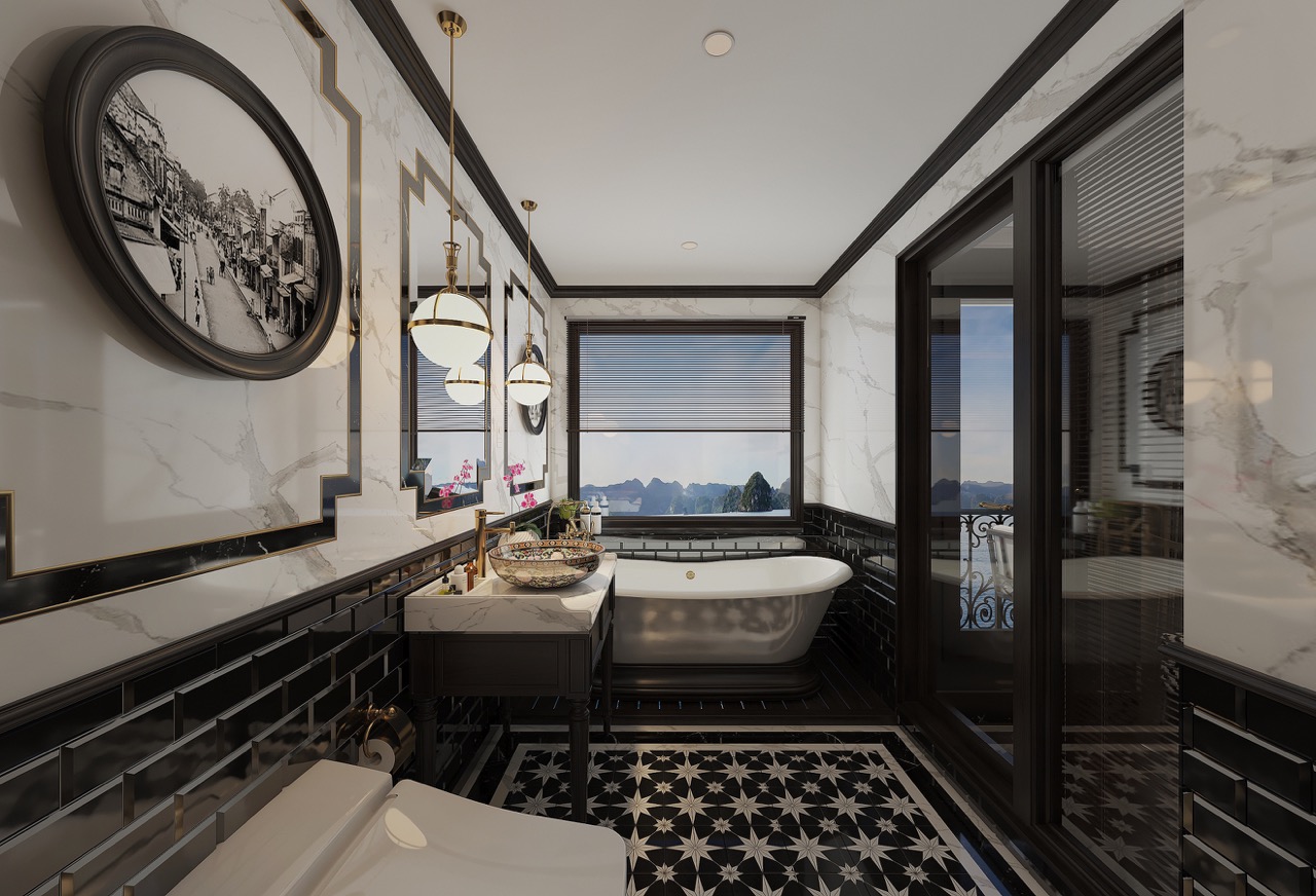 Luxury modern bathroom with marble walls, black accents, and scenic mountain view window.