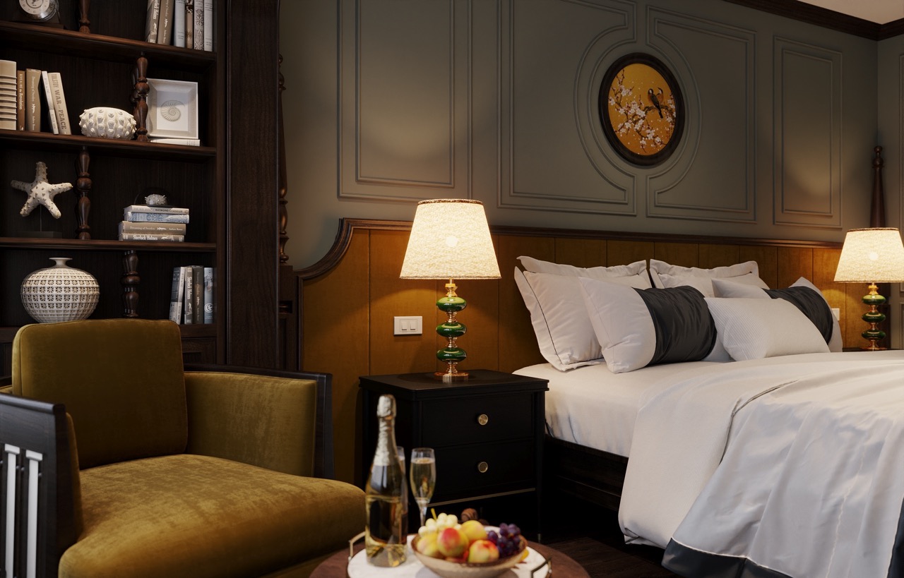 Luxurious hotel bedroom with elegant decor, plush bedding, and warm lighting for a comfortable stay.