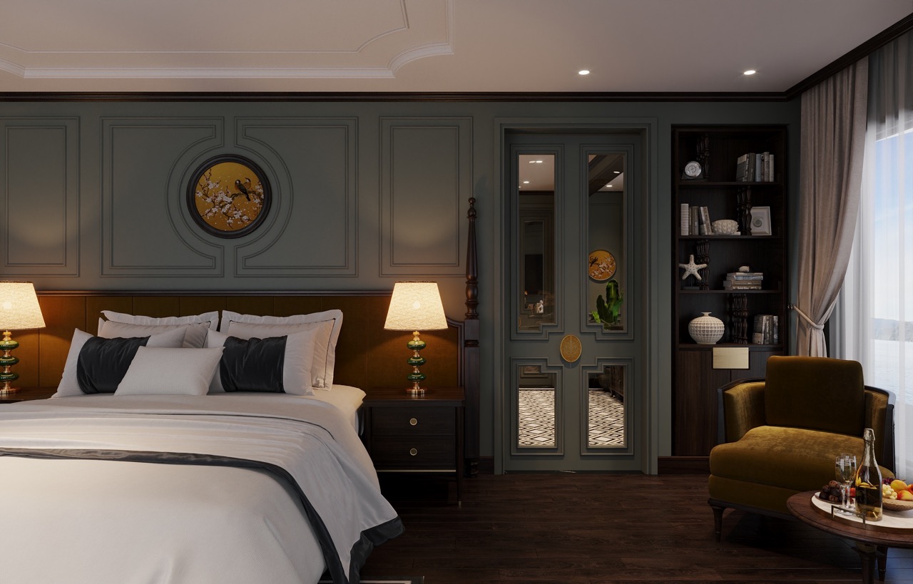 Luxurious hotel bedroom with elegant decor, soft lighting, and spacious seating area.