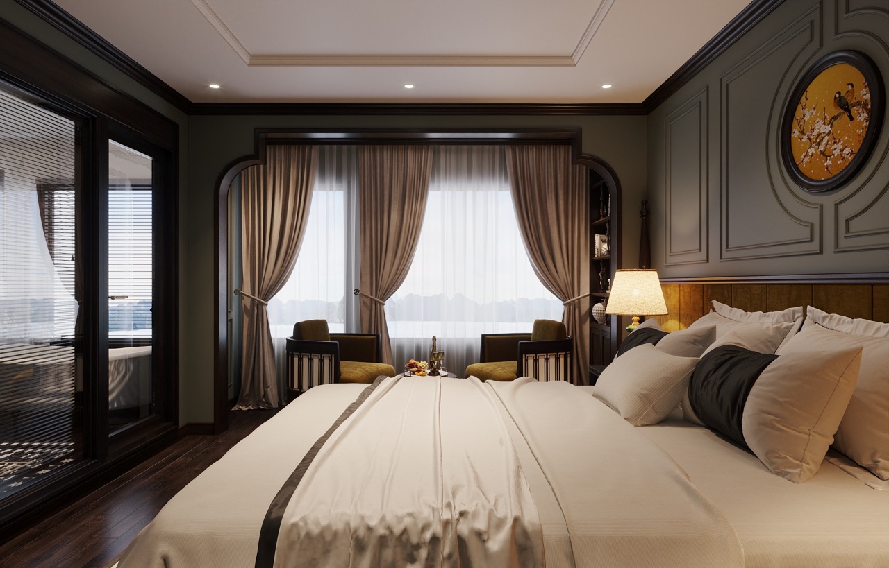 Elegant hotel bedroom with large windows, luxurious curtains, and cozy seating area - perfect for relaxing stays.