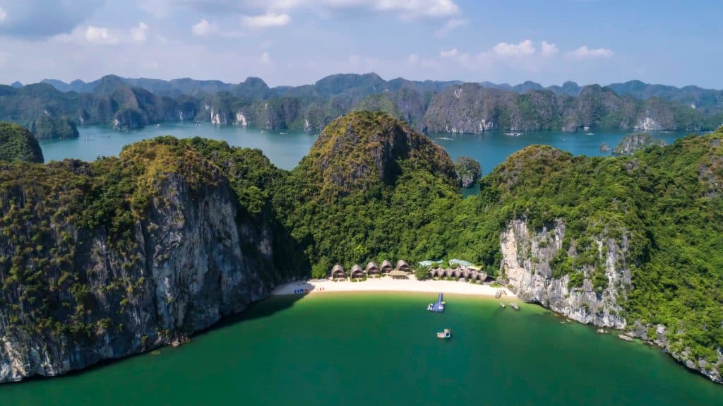Spectacular view of Halong Bay with lush islands and clear waters, perfect for Vietnam travel adventures.