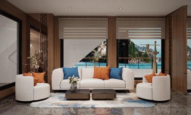 Elegant seaside living room with ocean views, modern furniture, and stylish decor.